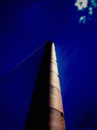 Low angle view of built structure against blue sky