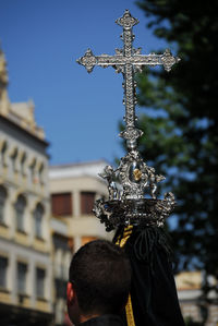 Low angle view of statue against building