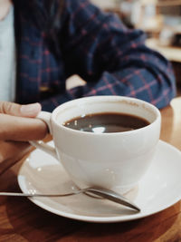 Coffee cup on table