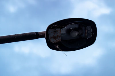 Close-up of old car against sky