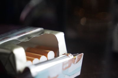 Close-up of cigarette on table