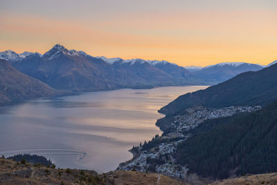 Scenic view of lake during sunset