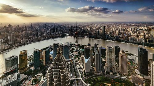 High angle view of modern buildings against sky in city