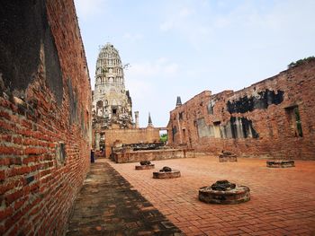 Old ruins of building against sky