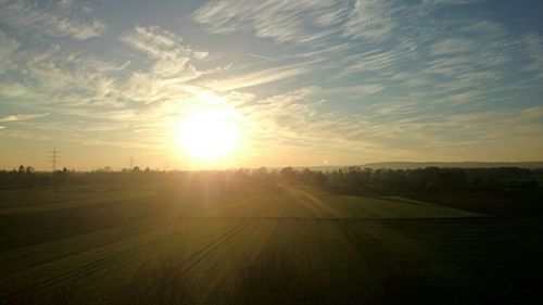 Scenic view of landscape at sunset