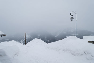 Overhead cable car against mountains during winter