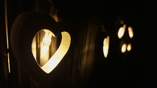 Close-up of illuminated heart shape at night