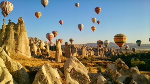 View of hot air balloons flying in sky