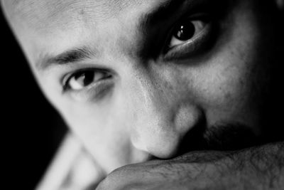 Close-up portrait of shirtless man