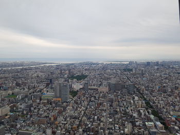 High angle shot of townscape against sky