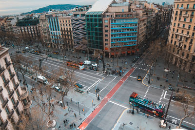 High angle view of vehicles on road in city