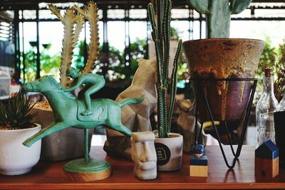 Close-up of statues on table