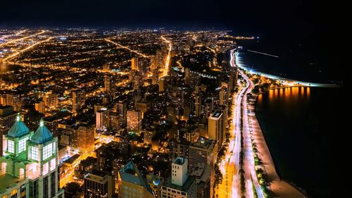 High angle view of illuminated cityscape at night,hancock center observatory - north view,chicago