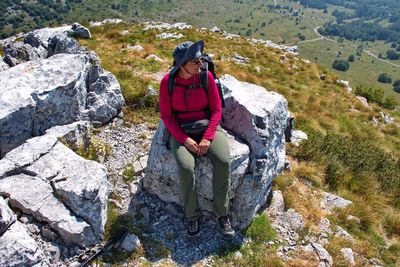 Senior woman hiking in velebit mountain, croatia