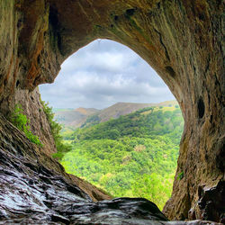 Scenic view from inside of thors cave in the peak district