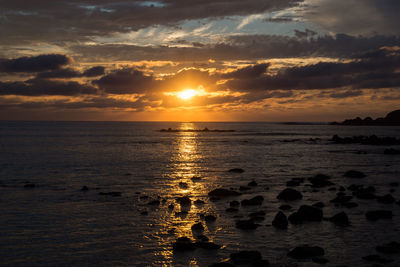 Scenic view of sea against sky during sunset