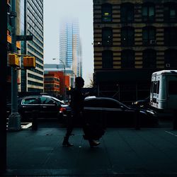 People walking on street in city