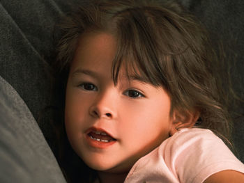 Close-up of cute girl at home