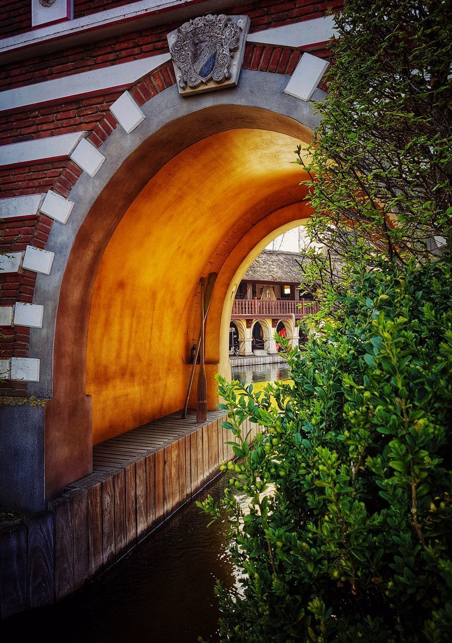 VIEW OF BUILDING AND BRIDGE