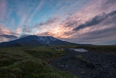 Scenic view of landscape against sky during sunset