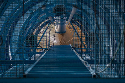 Low angle view of illuminated staircase in factory