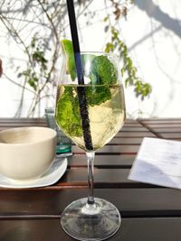 Close-up of wine in glass on table