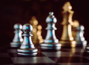 Close-up of chess pieces against blurred background