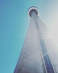 Low angle view of tower against blue sky