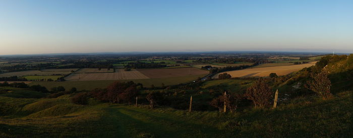 High angle view of field against clear sky