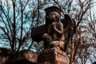 Low angle view of statue against sky