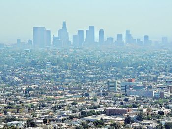 Aerial view of cityscape against clear sky