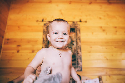 Portrait of cute smiling boy at home