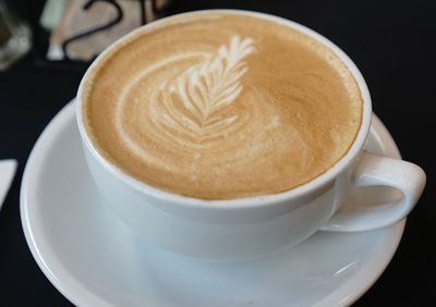Close-up of cappuccino on table