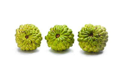 High angle view of fruits against white background