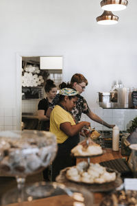 People working in cafe