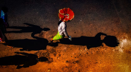 High angle view of man working on floor