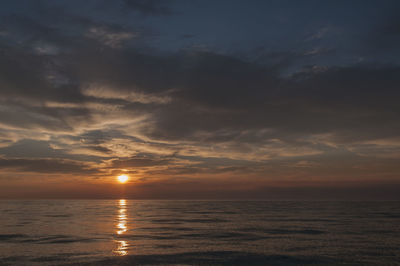 Scenic view of sea at sunset