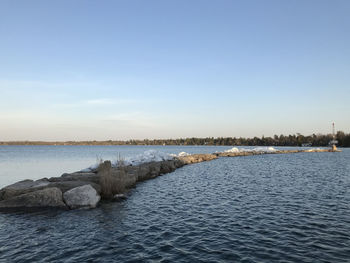 Scenic view of sea against clear sky