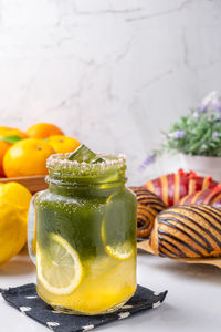 Close-up of fruits in glass on table