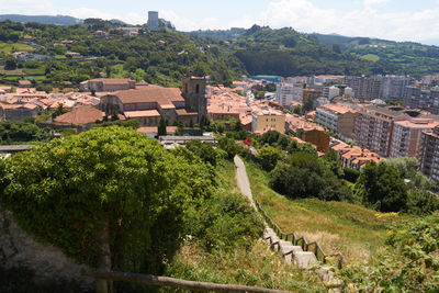 High angle view of townscape and trees in city