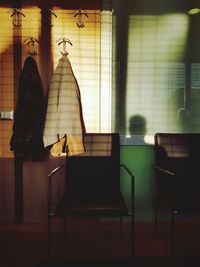 Shadow of people on chair at home