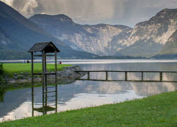 Scenic view of lake and mountains against sky.  hallstatt. austria.