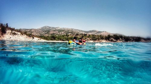 Tourists enjoying in sea