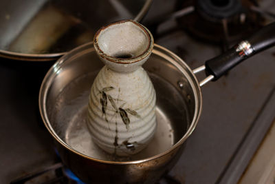 High angle view of tea in container