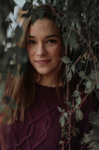 Portrait of a smiling young woman outdoors