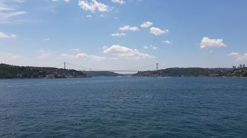 Scenic view of bay bridge against sky