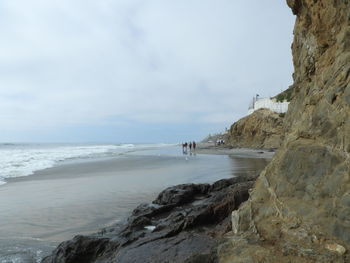 Scenic view of beach and sea against sky