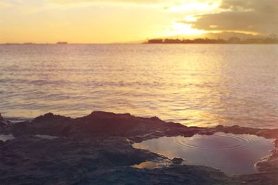 Scenic view of sunset over sea