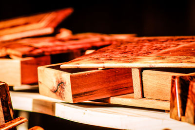 Close-up of drawers on table