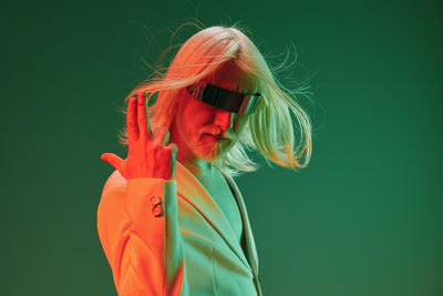 Rear view of woman with eyes closed